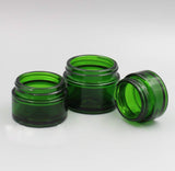 30ML(1 OZ) Green Glass Empty Refillable Cosmetic Cream Jar Pot Bottle Container With Black Cap for Salve Face Cream Lip Balm Lotion And DIY Homemade Products (4PCS)