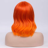BERON Women's Short Orange Wavy Bob Wig Curly Wig with Fringe Bangs Halloween Cosplay Wig Daily Use Synthetic Wigs (Ombre Orange)