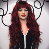 AISI QUEENS Long Wavy Wine Red Hair Wig With Bangs for Women Girls Cosplay Fluffy Wavy Natural Looking Heat Resistant Synthetic Hair Wig for Daily Use 24 inch