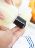 4 oz/120 ml Clear Natural Squeeze LDPE Plastic Bottle with Black Disc Cap (12 Pack) + Funnel