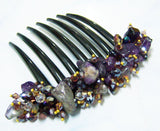 French twist hair comb Ornamented along the top of the heading with Stone Purple.