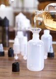 4 oz/120 ml Clear Natural Squeeze LDPE Plastic Bottle with Black Disc Cap (12 Pack) + Funnel