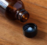 2 oz Amber Glass Boston Round Bottle with Black Phenolic Cone Lined Caps (6 Pack) + Travel Bag and Funnel